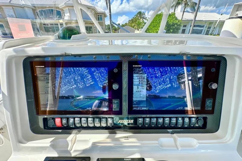  Yacht Photos Pics Boat dashboard with dual navigation screens on a 2006 Jupiter 31FS.