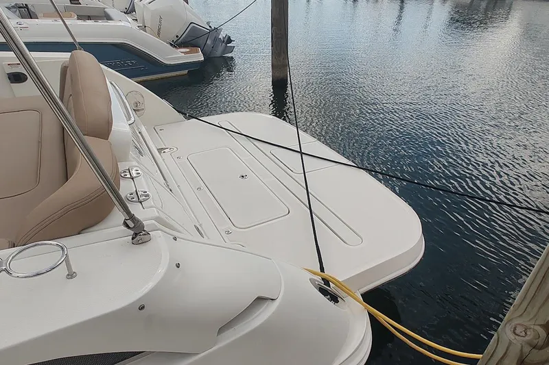  Yacht Photos Pics 2017 Sea Ray Sundancer 310 docked, featuring a spacious swim platform and comfortable seating.