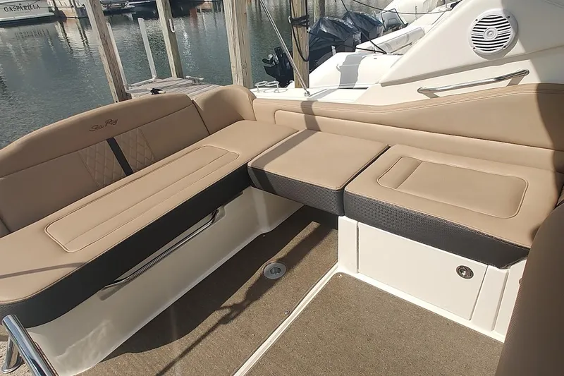  Yacht Photos Pics 2017 Sea Ray Sundancer 310 interior with beige seating and marine speaker.
