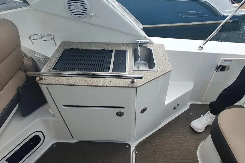  Yacht Photos Pics 2017 Sea Ray Sundancer 310 boat kitchenette with grill and sink.