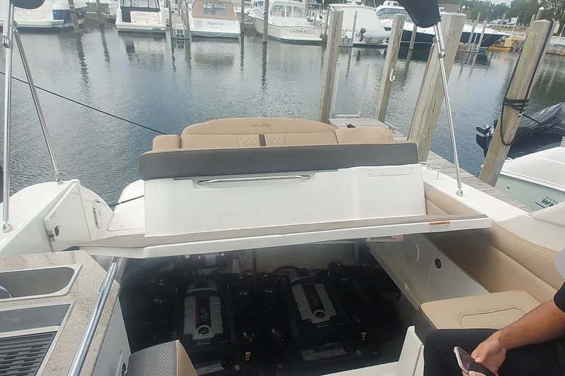  Yacht Photos Pics 2017 Sea Ray Sundancer 310 with open engine compartment at marina dock.