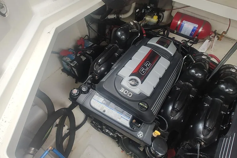  Yacht Photos Pics Engine compartment of 2017 Sea Ray Sundancer 310 with 6.2L engine and fire extinguisher.