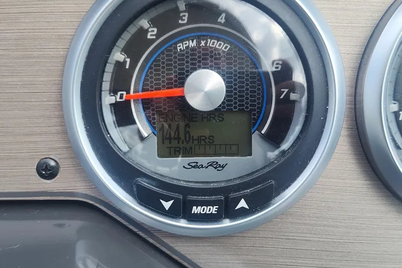  Yacht Photos Pics Close-up of Sea Ray Sundancer 310 tachometer showing 144.6 engine hours.