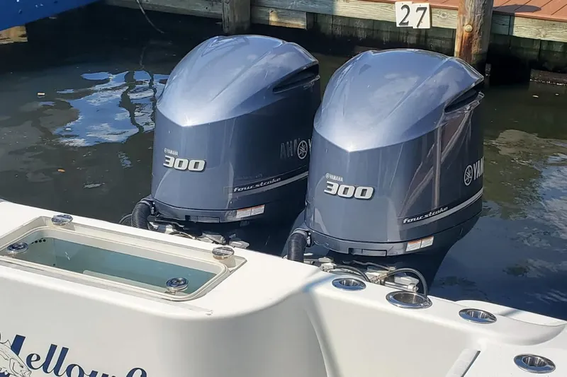 Salty Dog 2 Yacht Photos Pics 2013 Yellowfin 32 boat with twin Yamaha 300 outboard engines docked.