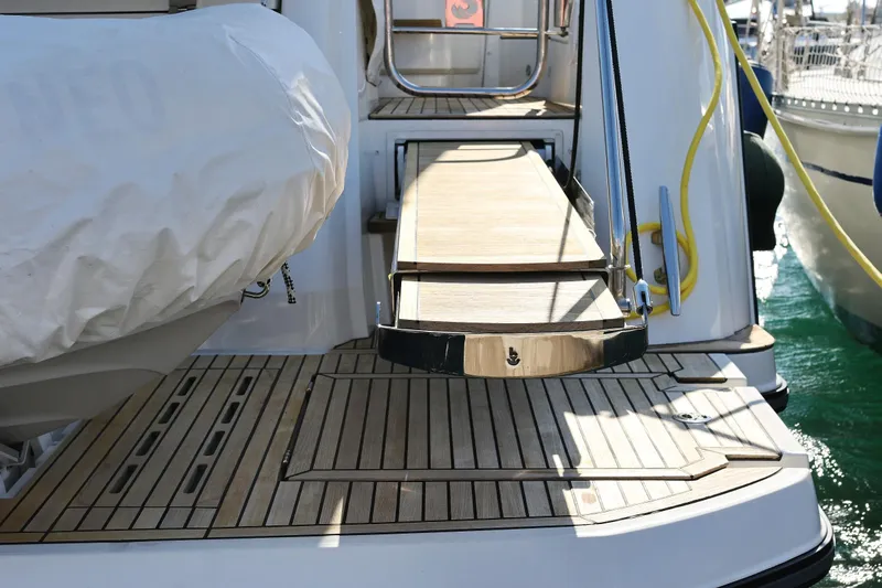Neo Yacht Photos Pics Beneteau Monte Carlo 52 yacht boarding platform, 2022 model, with teak decking.