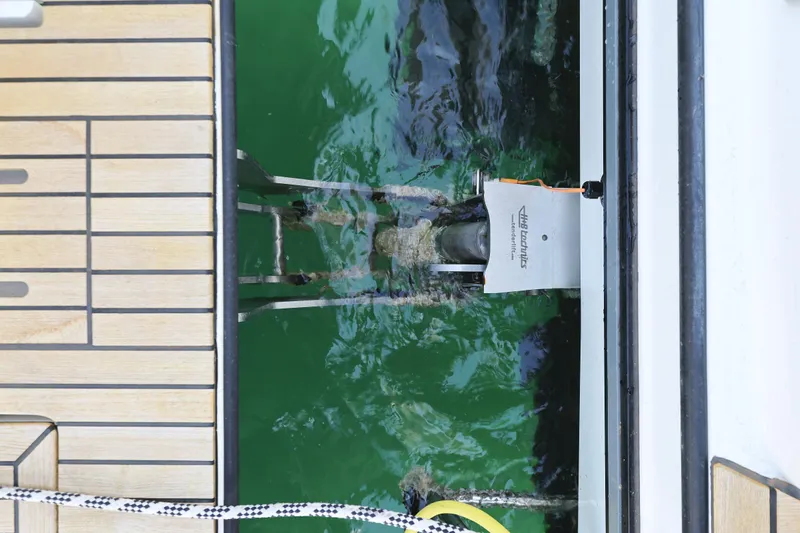 Neo Yacht Photos Pics Swim platform of 2022 Beneteau Monte Carlo 52 yacht with ladder in water.