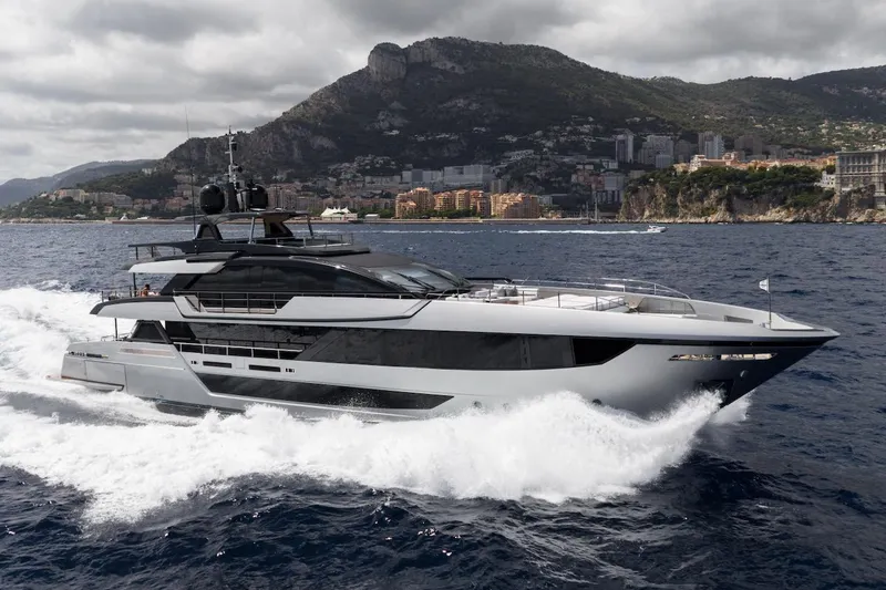 Tasty Waves Yacht Photos Pics Luxury yacht Riva 130' Bellissima 2025 cruising near scenic coastline.