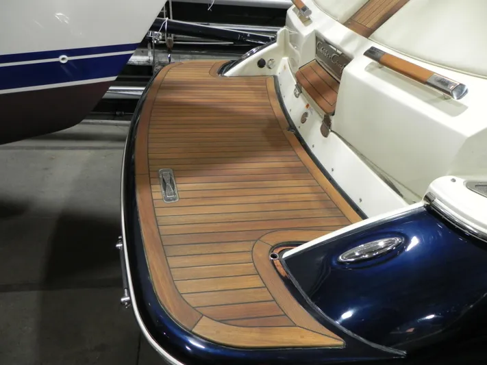 Yours To Name Yacht Photos Pics 2015 Chris-Craft 28 Heritage Corsair boat with elegant wooden deck detailing.