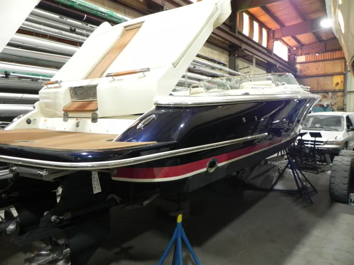 Yours To Name Yacht Photos Pics 2015 Chris-Craft 28 Heritage Corsair boat in a storage facility.