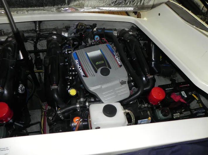 Yours To Name Yacht Photos Pics Engine compartment of a 2015 Chris-Craft 28 Heritage Corsair boat.