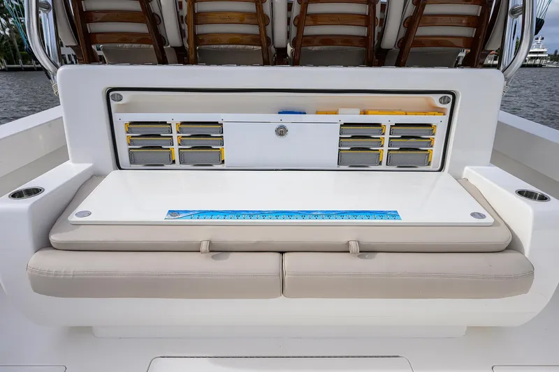 22 Yacht Photos Pics 2022 Valhalla V-46 Center Console boat with organized storage compartments and cushioned seating.