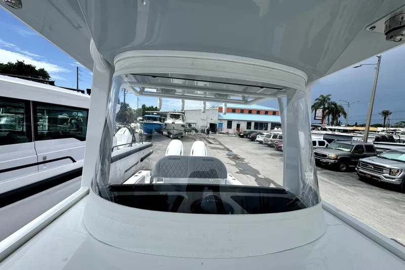  Yacht Photos Pics 2024 Bluewater 25t boat at dealership, showcasing interior and exterior design.