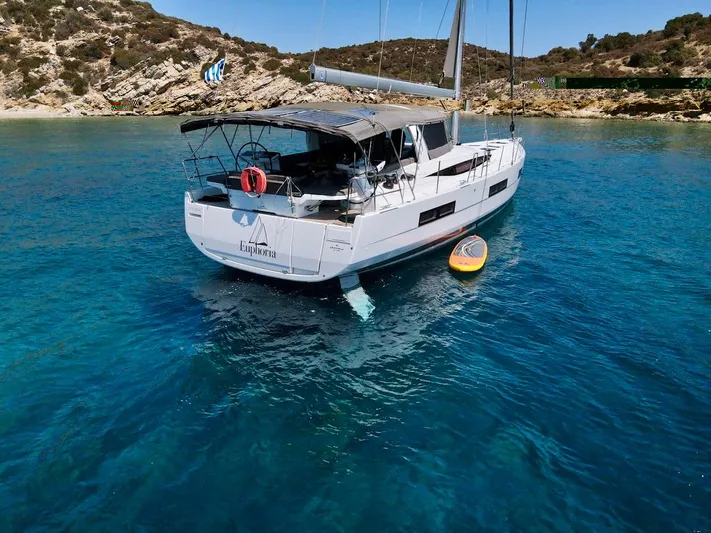 Euphoria Yacht Photos Pics Jeanneau 60 yacht anchored in clear blue water, 2021 model.