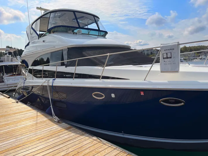 Saoirse Yacht Photos Pics 2011 Meridian 441 Sedan yacht docked at marina under blue sky.