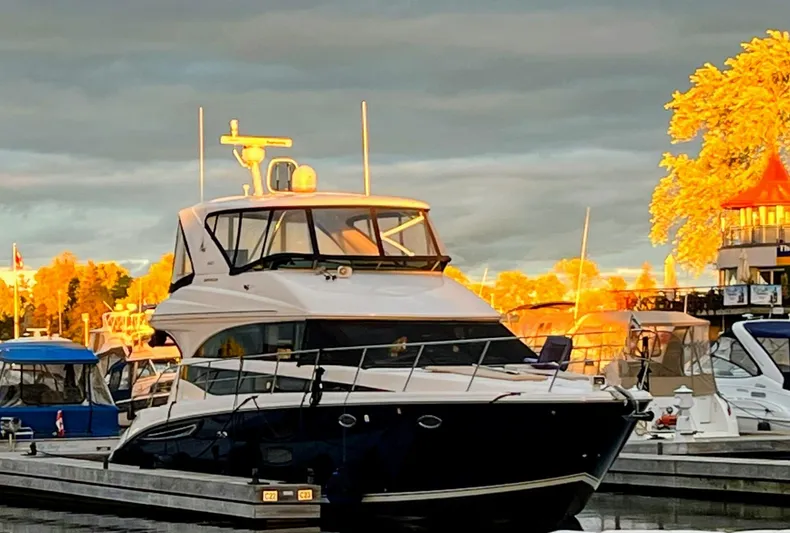 Saoirse Yacht Photos Pics 2011 Meridian 441 Sedan yacht docked at marina during sunset.