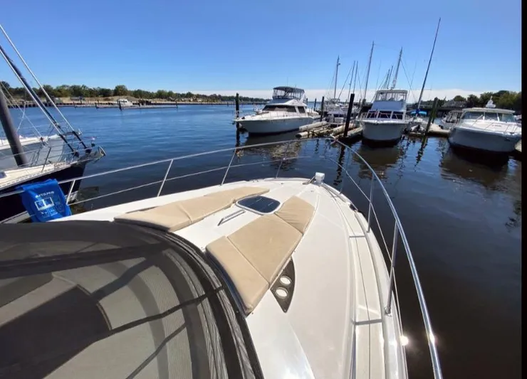 Saoirse Yacht Photos Pics 2011 Meridian 441 Sedan yacht docked at marina with other boats.