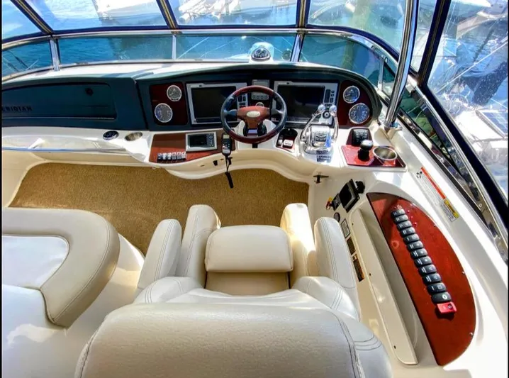 Saoirse Yacht Photos Pics 2011 Meridian 441 Sedan helm with luxurious seating and advanced navigation controls.