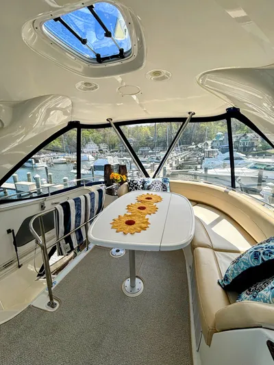 Saoirse Yacht Photos Pics Luxurious interior of 2011 Meridian 441 Sedan yacht with marina view.