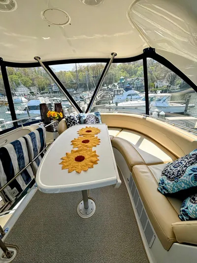 Saoirse Yacht Photos Pics Luxurious 2011 Meridian 441 Sedan yacht interior with elegant seating and decorative table setting.