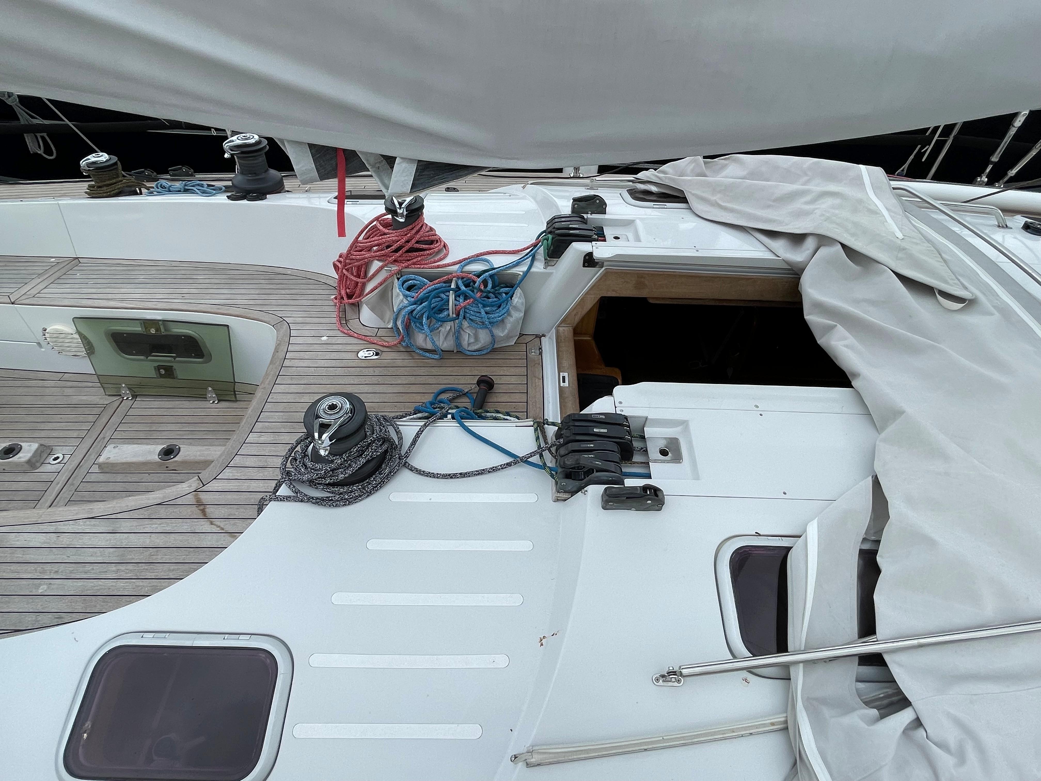 Deck of 2005 Comet 45 S sailboat with ropes and winches.