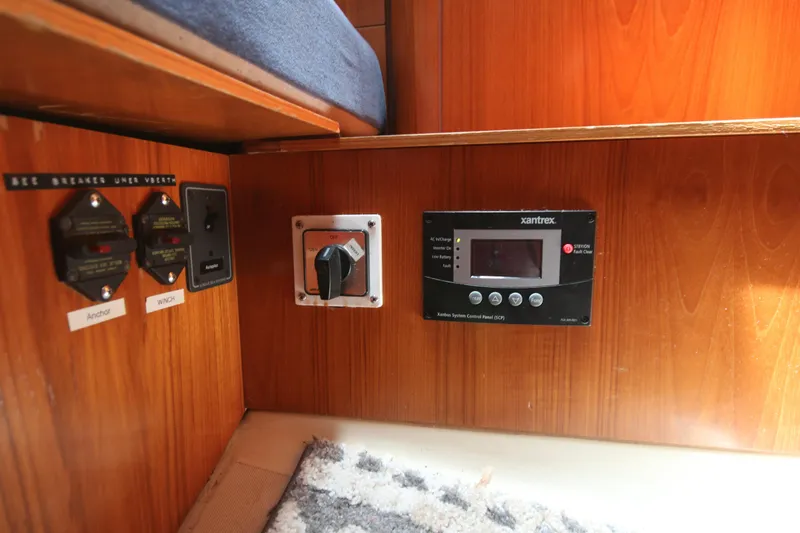 Exfil Yacht Photos Pics Control panel and switches inside a 1998 Beneteau Oceanis 461 yacht cabin.