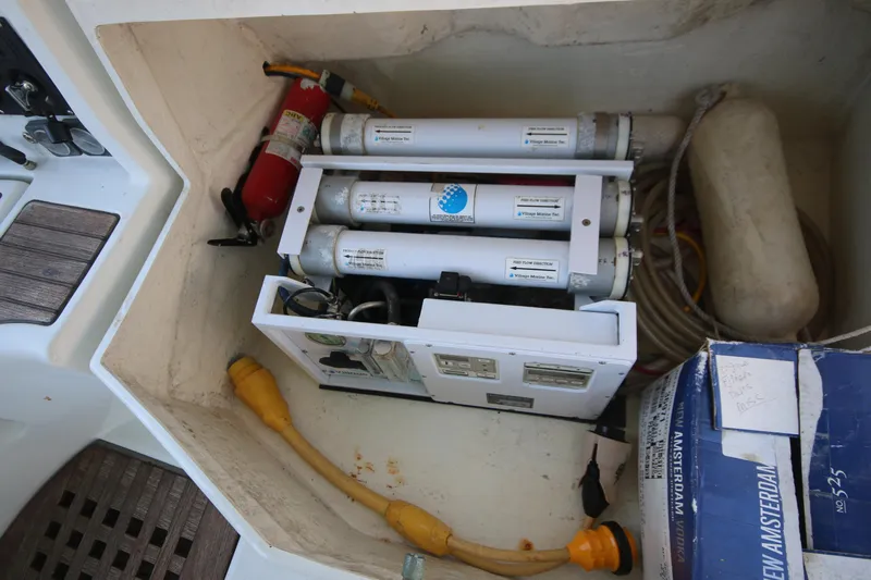 Exfil Yacht Photos Pics Storage compartment of a 1998 Beneteau Oceanis 461 yacht with equipment and supplies.