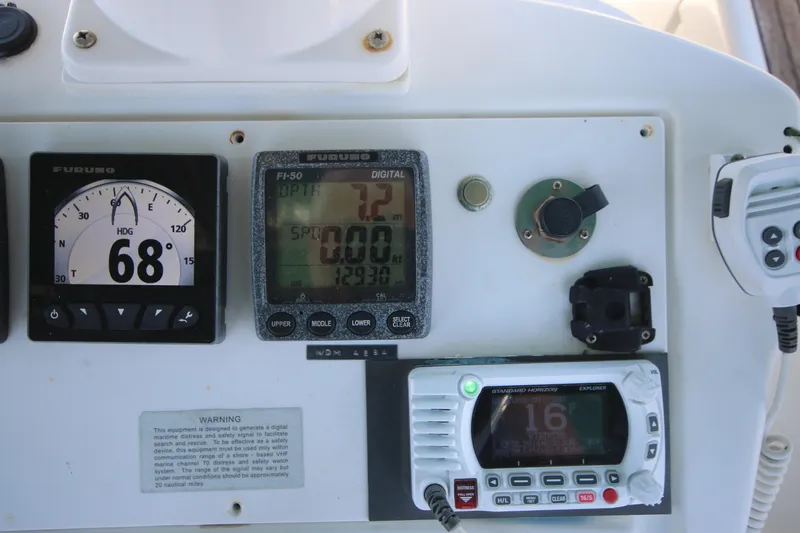 Exfil Yacht Photos Pics Control panel of 1998 Beneteau Oceanis 461 sailboat with navigation instruments.