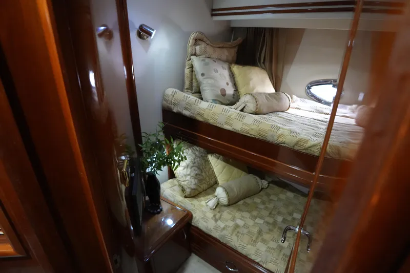 So Far Yacht Photos Pics Luxurious cabin interior of 2004 Carver 560 Voyager yacht with cozy bunk beds.