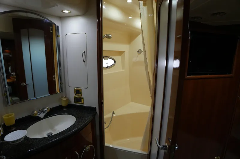 So Far Yacht Photos Pics Luxurious bathroom interior of 2004 Carver 560 Voyager yacht with sink and shower.