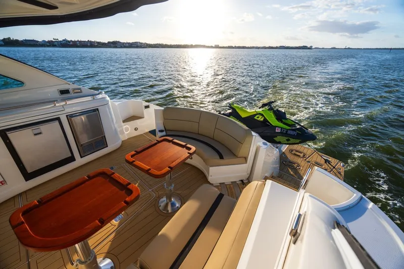 Epic Yacht Photos Pics Luxurious 2013 Cruisers Yachts 540 Sports Coupe with elegant deck and scenic water view.