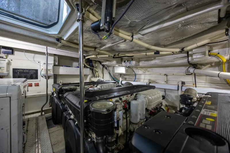 Epic Yacht Photos Pics Engine room of 2013 Cruisers Yachts 540 Sports Coupe, showcasing mechanical components and systems.