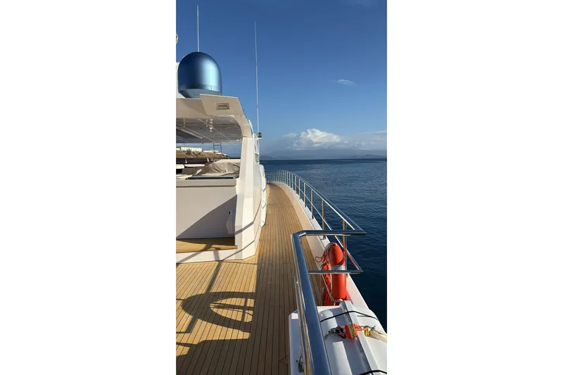 Elza Of London Yacht Photos Pics Luxurious 2015 Majesty 122 yacht deck with ocean view and clear blue sky.