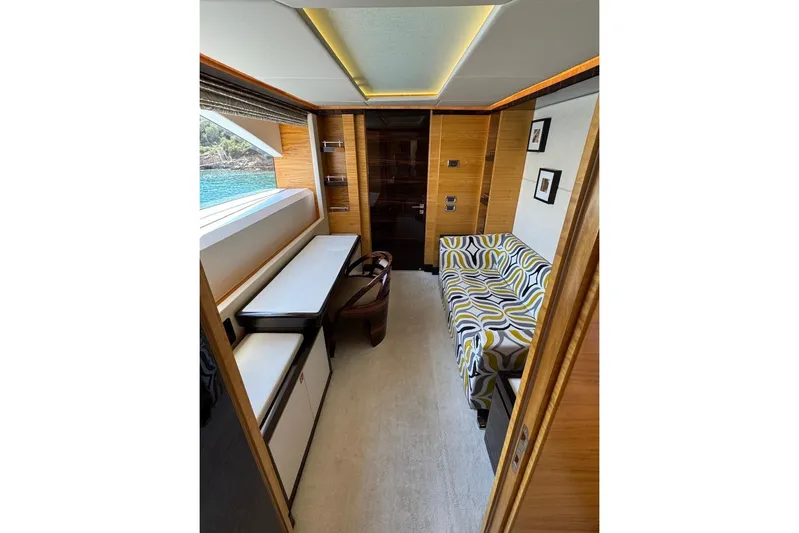 Elza Of London Yacht Photos Pics Luxurious interior of 2015 Majesty 122 yacht with modern decor and scenic window view.