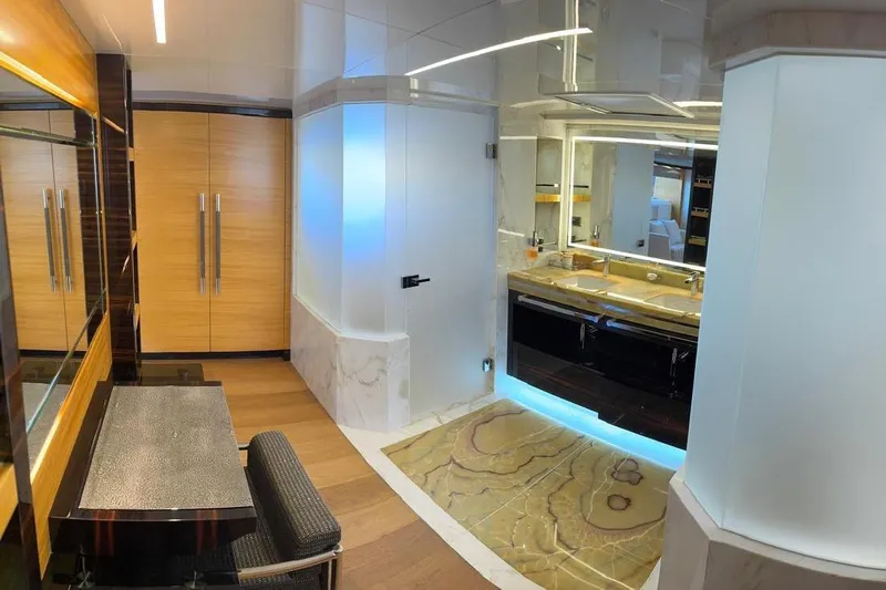 Elza Of London Yacht Photos Pics Luxurious interior of 2015 Majesty 122 yacht featuring elegant wood and marble finishes.