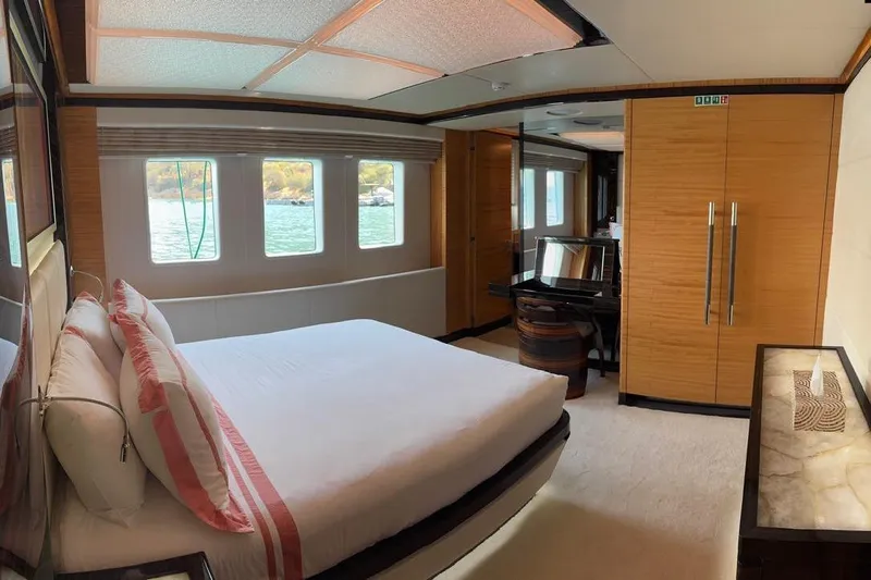 Elza Of London Yacht Photos Pics Luxurious bedroom interior on 2015 Majesty 122 yacht with elegant wood finishes and scenic windows.