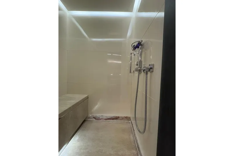 Elza Of London Yacht Photos Pics Luxurious shower area in 2015 Majesty 122 yacht, featuring modern fixtures and sleek design.