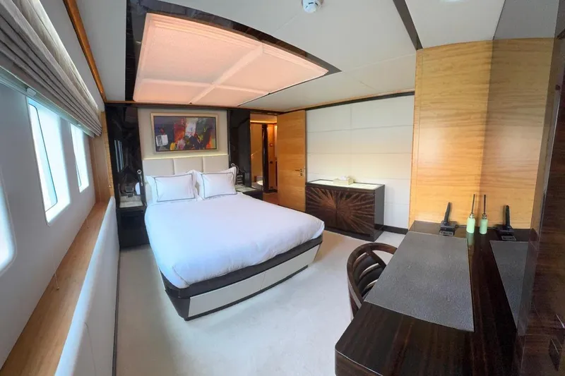 Elza Of London Yacht Photos Pics Luxurious bedroom interior of 2015 Majesty 122 yacht with modern decor and large windows.