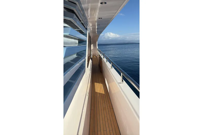 Elza Of London Yacht Photos Pics Side deck of 2015 Majesty 122 yacht with ocean view.