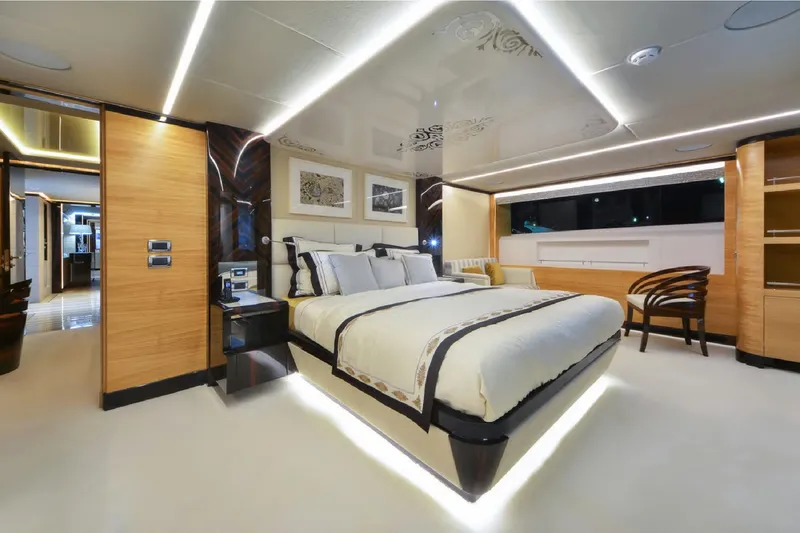 Elza Of London Yacht Photos Pics Luxurious bedroom interior on 2015 Majesty 122 yacht, featuring elegant design and modern furnishings.