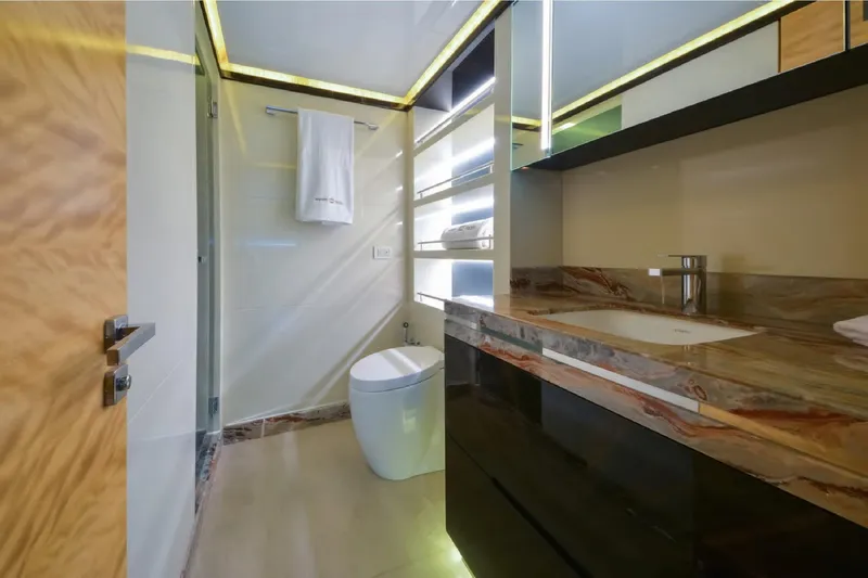 Elza Of London Yacht Photos Pics Luxurious bathroom interior on Majesty 122 yacht, featuring modern fixtures and elegant design, 2015 model.
