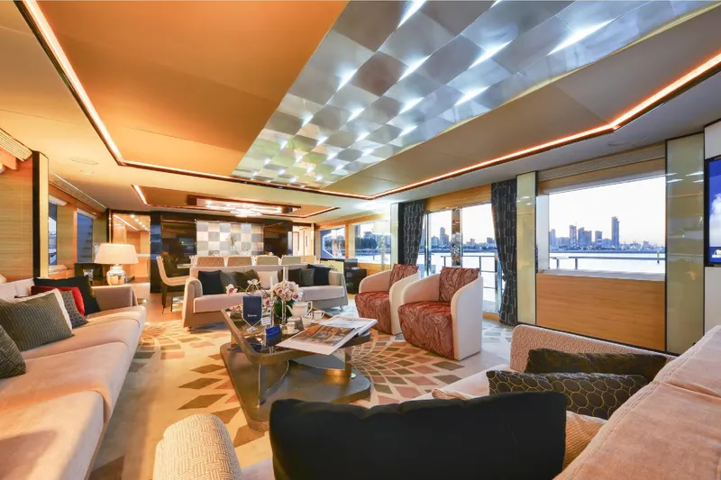 Elza Of London Yacht Photos Pics Luxurious interior of 2015 Majesty 122 yacht with elegant seating and panoramic windows.