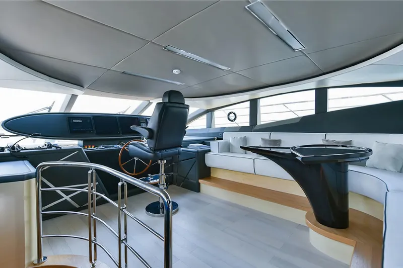 Elza Of London Yacht Photos Pics Luxurious interior of 2015 Majesty 122 yacht with modern helm and seating area.