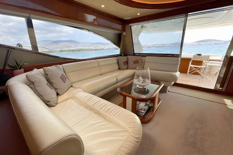 M/y Okiyo Yacht Photos Pics Luxurious interior of 2002 Ferretti Yachts 68 with elegant seating and scenic ocean view.