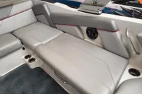 2019 MasterCraft NXT22 interior with gray seating and cup holders.