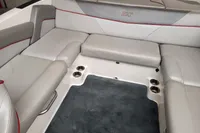 2019 MasterCraft NXT22 boat interior with gray seating and red accents.
