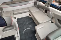 2019 MasterCraft NXT22 boat interior with gray seating and red accents.