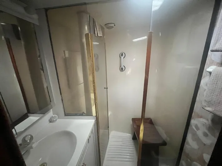 Fender Bender Yacht Photos Pics Bathroom interior of 1996 Ocean Yachts 48 Super Sport with shower and sink.