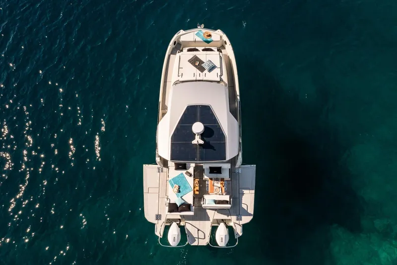  Yacht Photos Pics Aerial view of 2025 YOT 36 yacht on clear blue water.