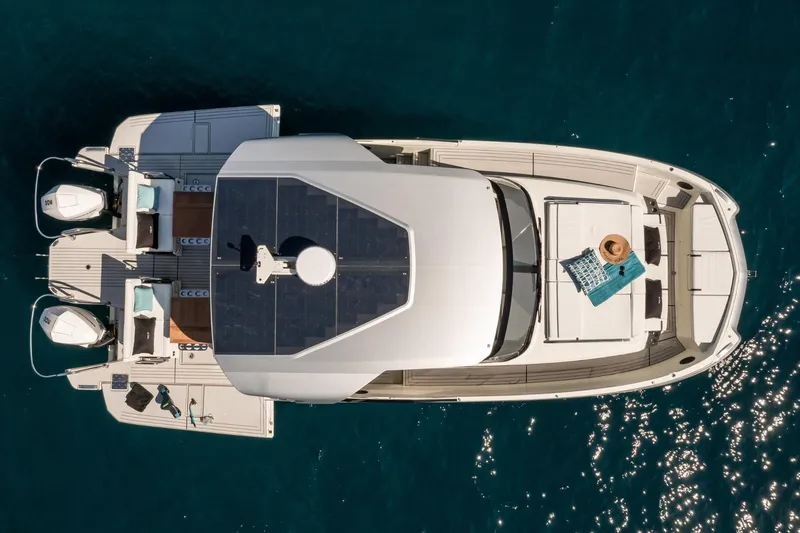  Yacht Photos Pics Overhead view of 2025 YOT 36 boat on sparkling blue water.