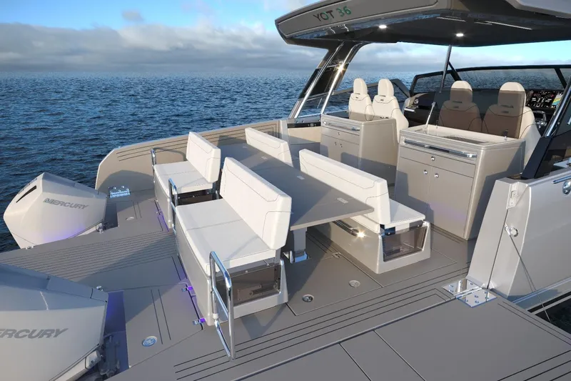  Yacht Photos Pics Luxurious 2025 YOT 36 boat interior with modern seating and sleek design on open water.